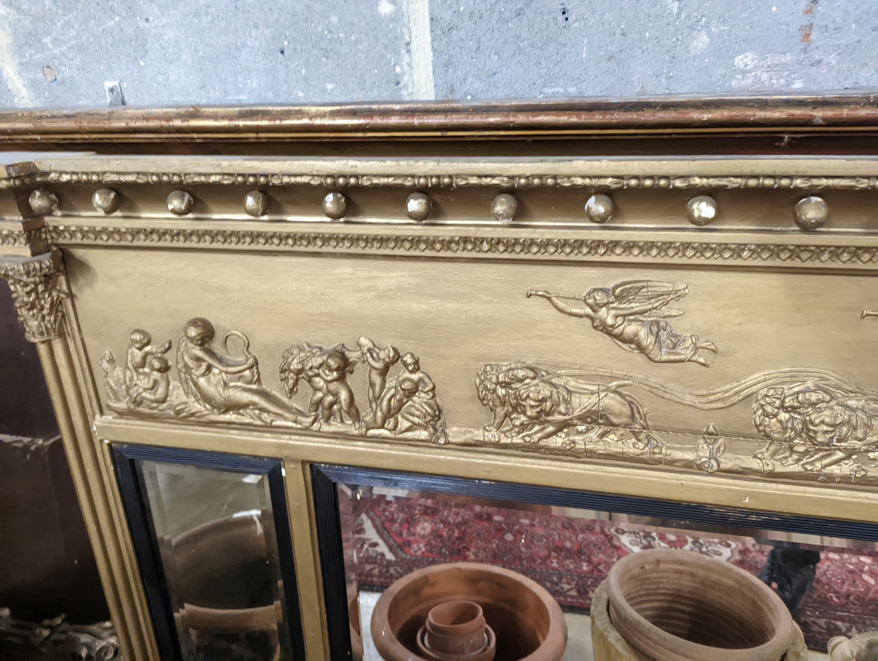A Regency triple plate overmantel mirror, width 134cm, height 94cm